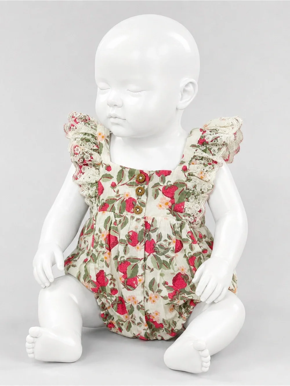 cupcakes & cashmere Cream Floral Ruffle Baby Romper with Pink Accents 3Months